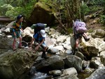 The river crossing, stepping stones require caution.